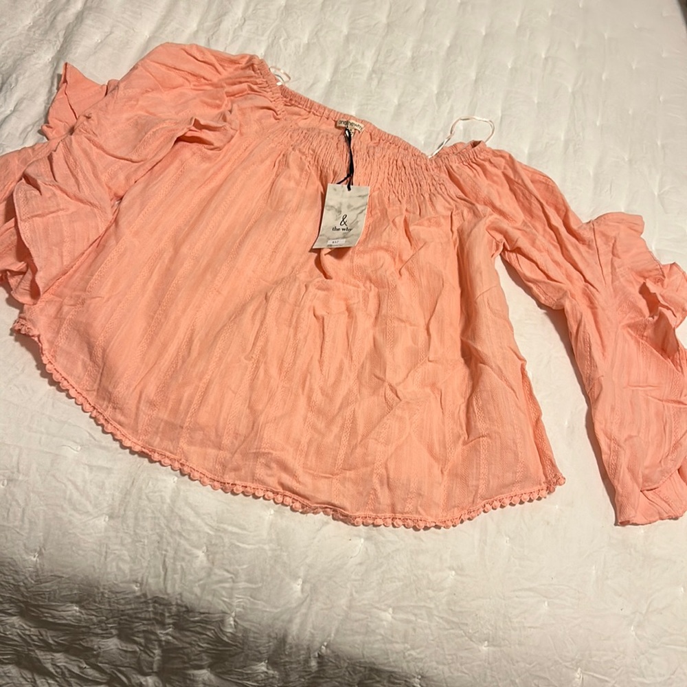 Peach blouse with ruffle sleeve